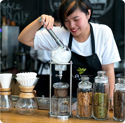 Barista making coffee
